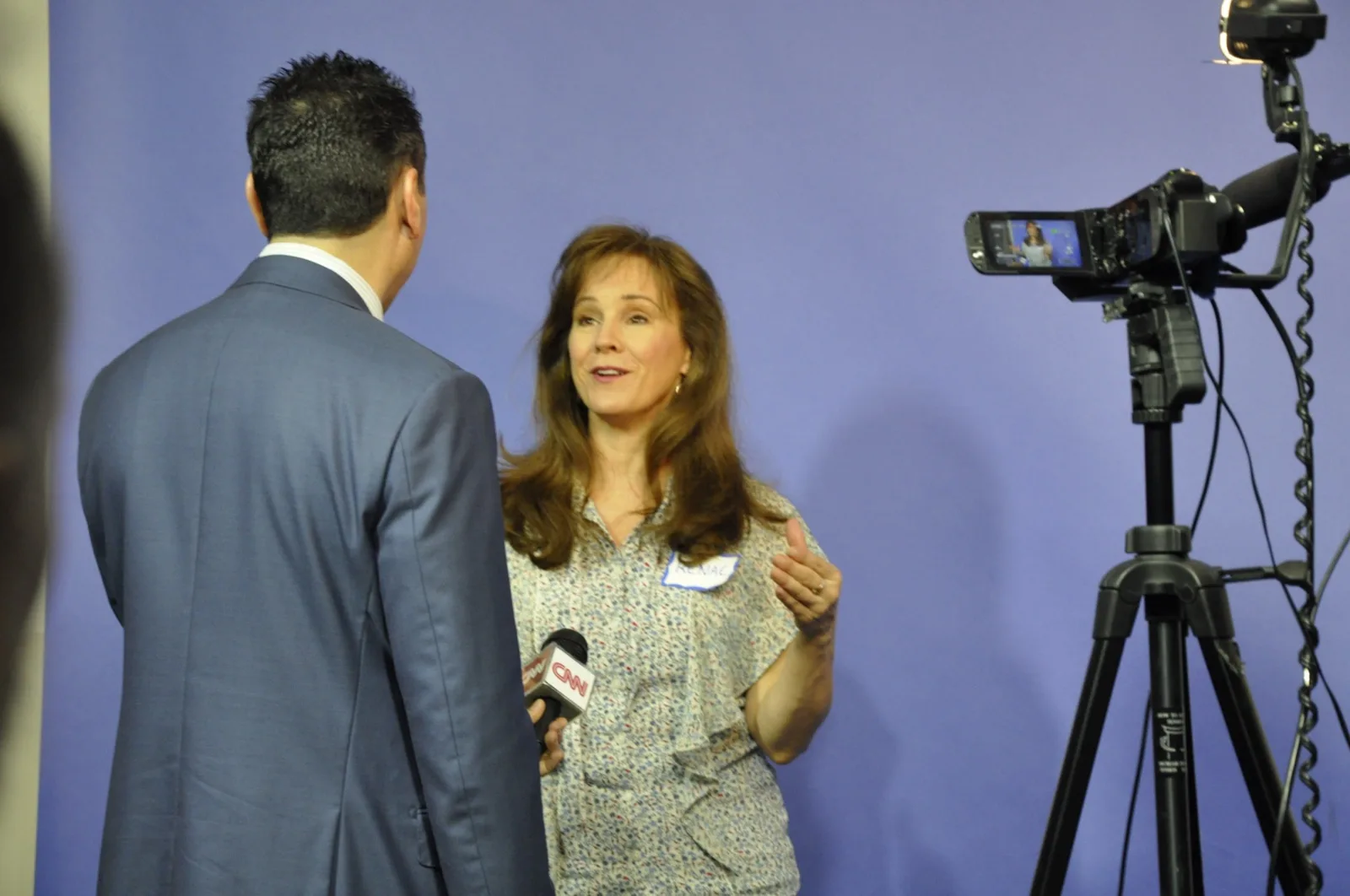 Jess Todtfeld coaching an executive through on-camera recorded practice during an executive presence coaching session